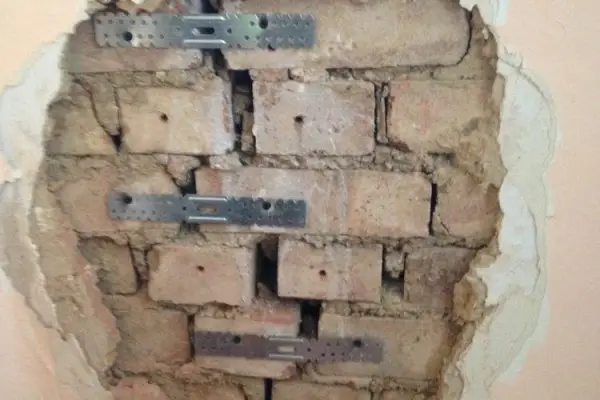 FIX HOLE IN BRICK WALL